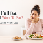 woman feeling full but still wanting to eat during weight loss