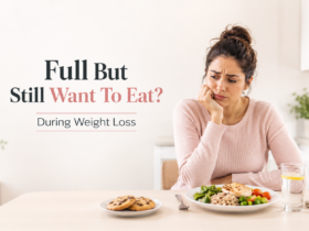 woman feeling full but still wanting to eat during weight loss